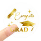 G2PLUS Graduation Stickers, 120PCS Congrats Grad Stickers, 1.6in Gold Foil Graduation Cap Stickers, Transparent Graduation Envelope Seal Sticker for Graduation Invitation and Grad Party Favors