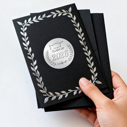 G2PLUS 100Pcs Class of 2026 Stickers - Silver Foil Embossed Graduation Stickers 2 Inch Graduation Cap Envelope Seal Labels for Diplomas Certificates Gradutes Awards Invitation Party Favors